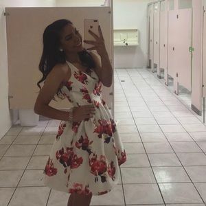 White dress with red print flowers